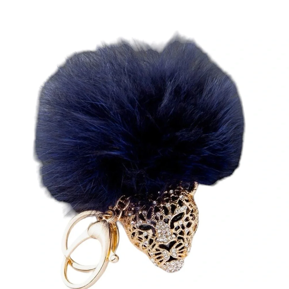 Leopard pompom bag charm key ring navy blue